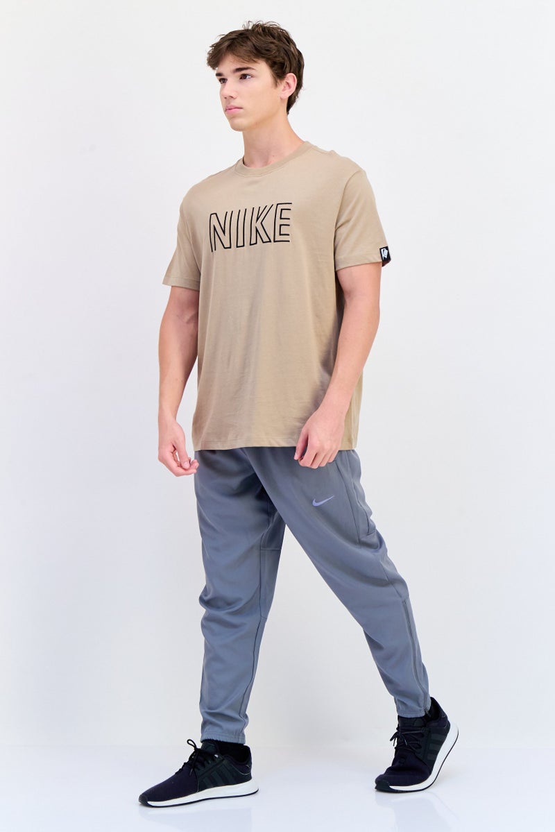 Nike Men Loose Fit Short Sleeve Outdoor T-Shirt, Tan  - Image 2