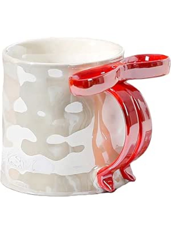 This elegant porcelain mug features a unique bow-shaped handle that adds a stylish and charming touch to its design. It combines beauty and practicality, making it perfect for everyday use or stylish serving. - Image 2