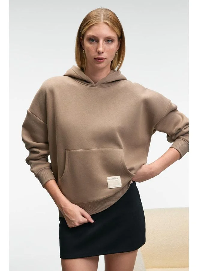 Grimelange CLARIE Women's Organic Cotton Oversized Kangaroo Pocket Hooded Vizon Sweatshirt.