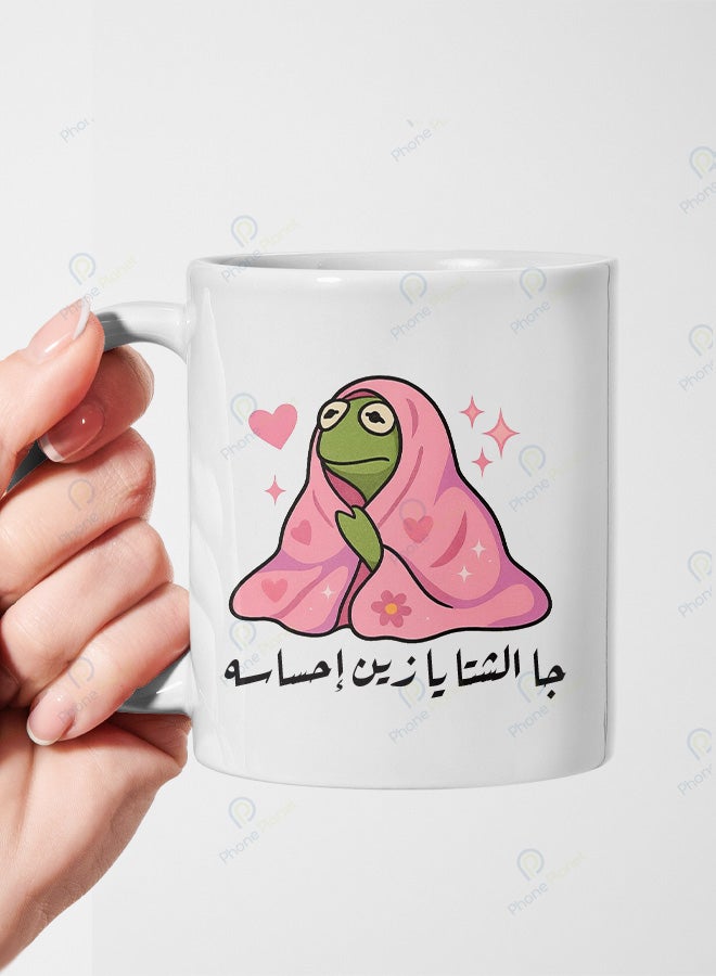 A ceramic mug printed with the phrase Winter has arrived how wonderful its feeling is and featuring a comfortable handle