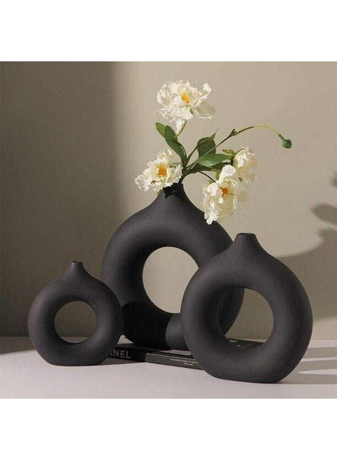 Elegant 3-piece vase set with a matching design that combines simplicity and sophistication, black color.