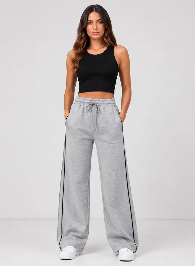 تايك تو Grey High Rise Contrast Piping Wide Leg Joggers By Gravt