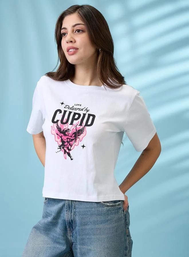 جلو باص بلوزة واسعة بياقة دائرية بطبعة جرافيك