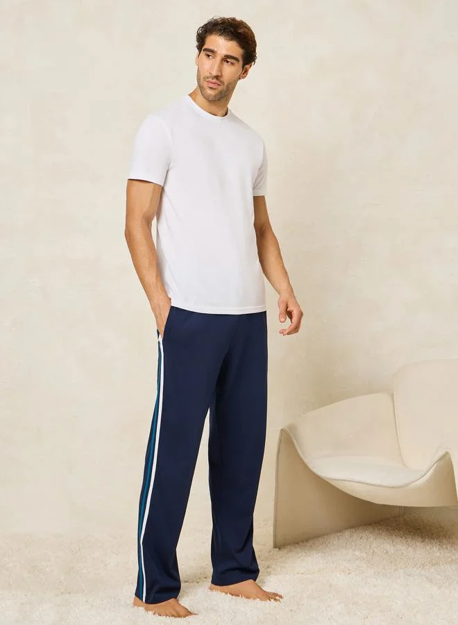 ستايلي Solid T-Shirt & Open Hem Piping Detail Pyjama Set