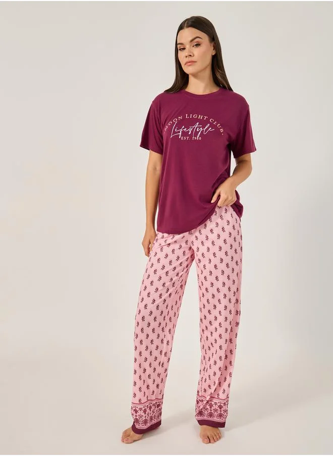 Styli Slogan Print Dropped Shoulder T-Shirt and Pyjama Pants Set