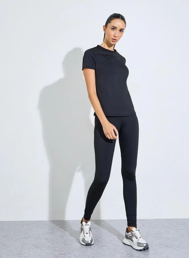 ستايلي اكتيف Black Logo Contrast Stitch Detail Short Sleeves Top and Leggings Set