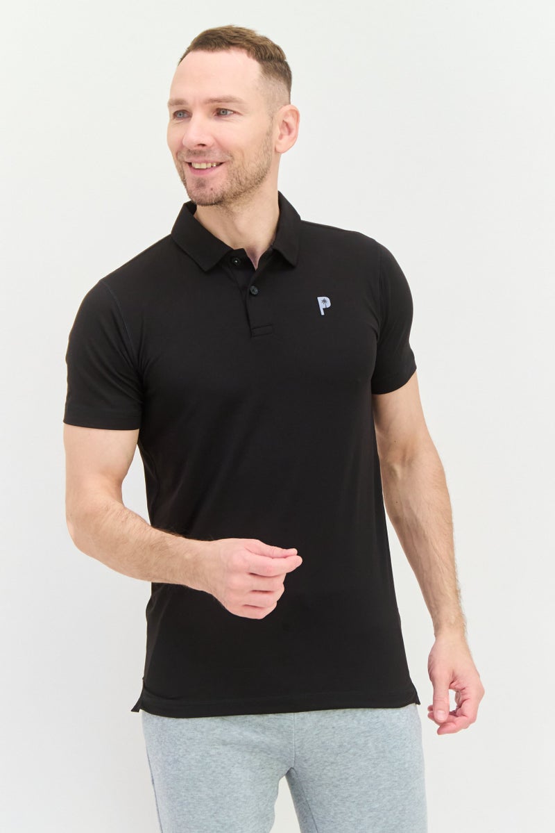 Puma x Palm Tree Crew Men Sportswear Fit Short Sleeves Golf Polo Shirt, Black - Image 1