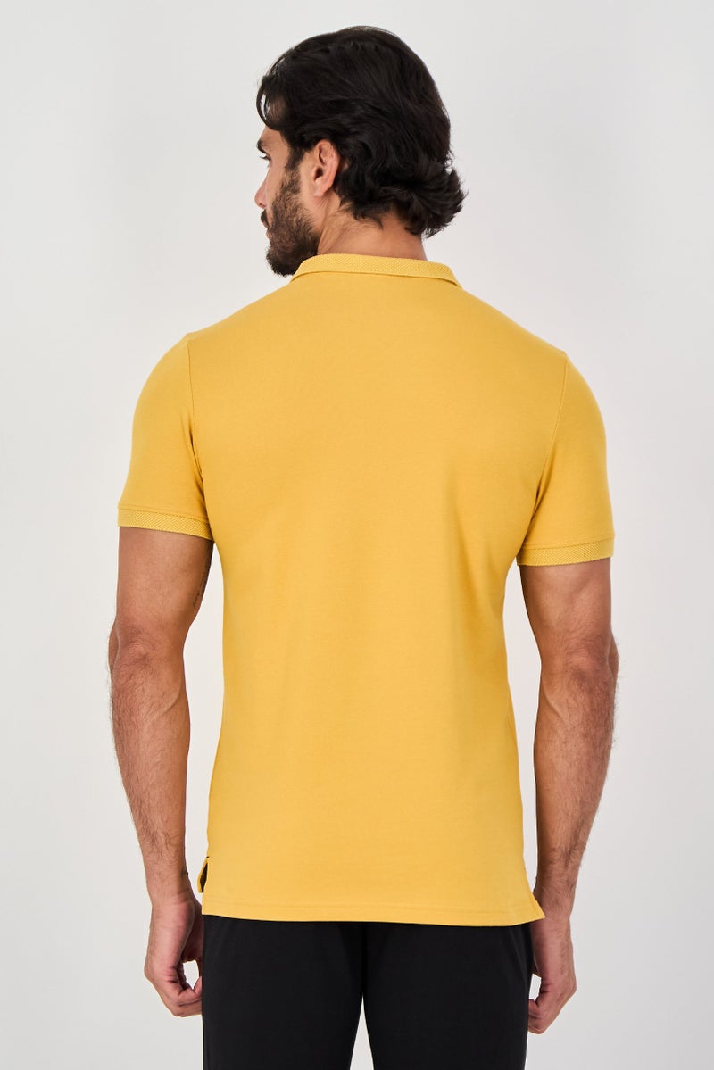 PUMA Men Slim Fit Short Sleeve Outdoor Polo Shirt, Mustard - Image 3