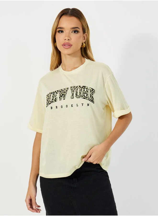 Styli Slogan Print Short Sleeves Boxy Fit T-shirtâ€‹