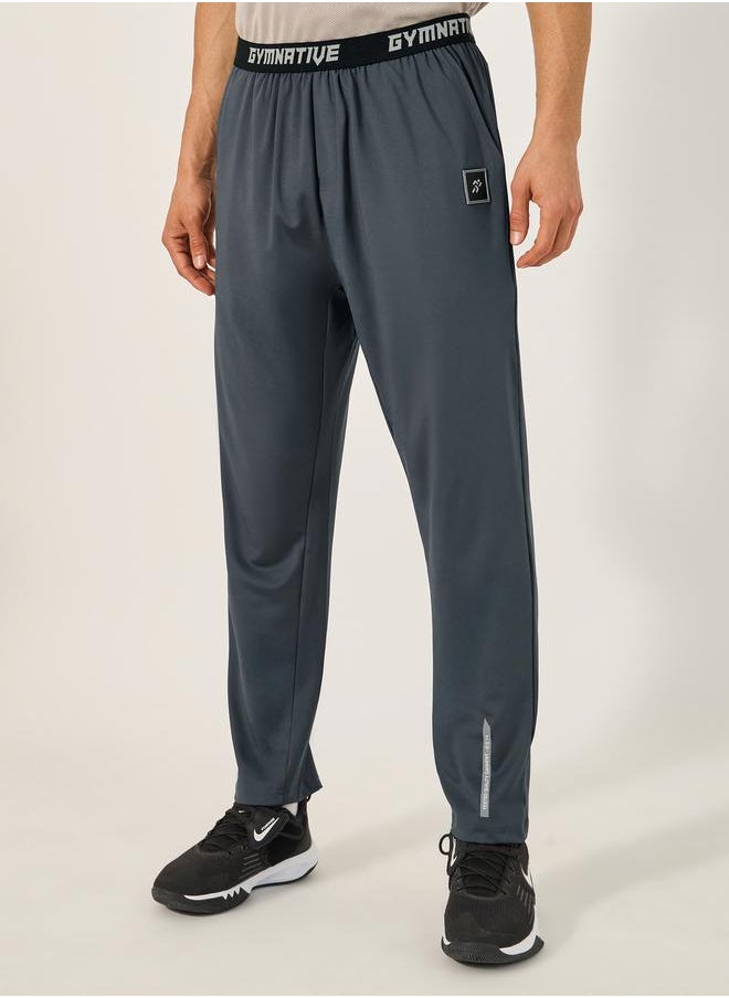 Styli Slim Fit Badge Detail Track Pants with Printed Waistband  - Image 1