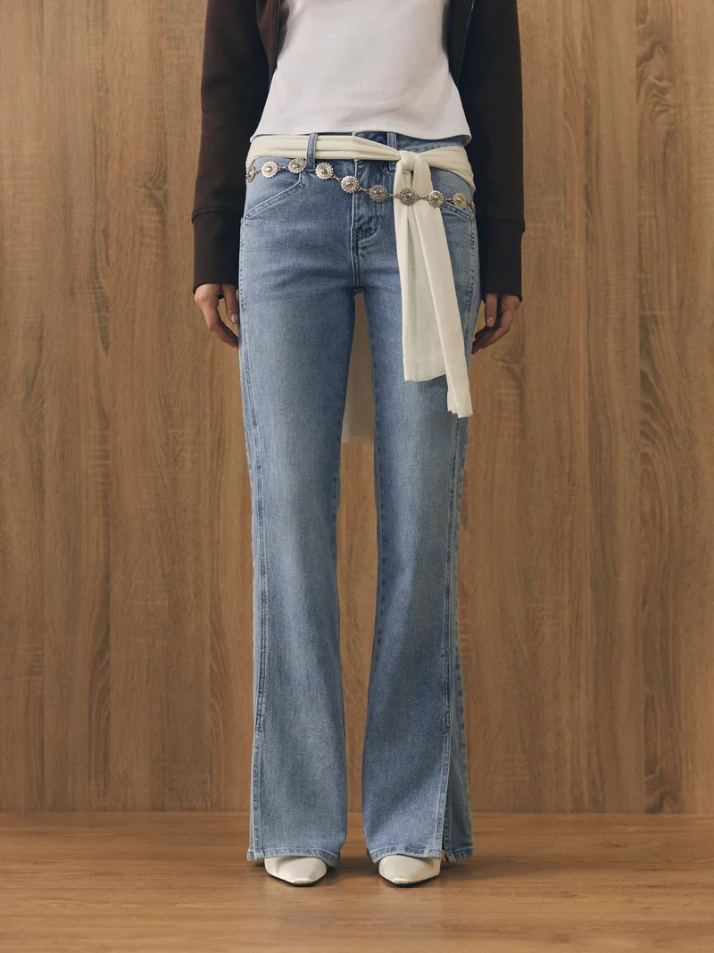 Flared jeans with slits on the sides