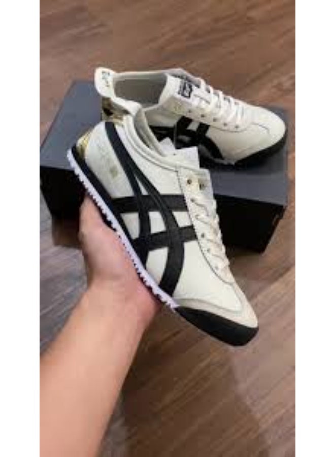 Onitsuka Tiger أوني تسوكا تايجر مكسيكو 66 أبيض بخطوط سوداء مسطحة - Image 1