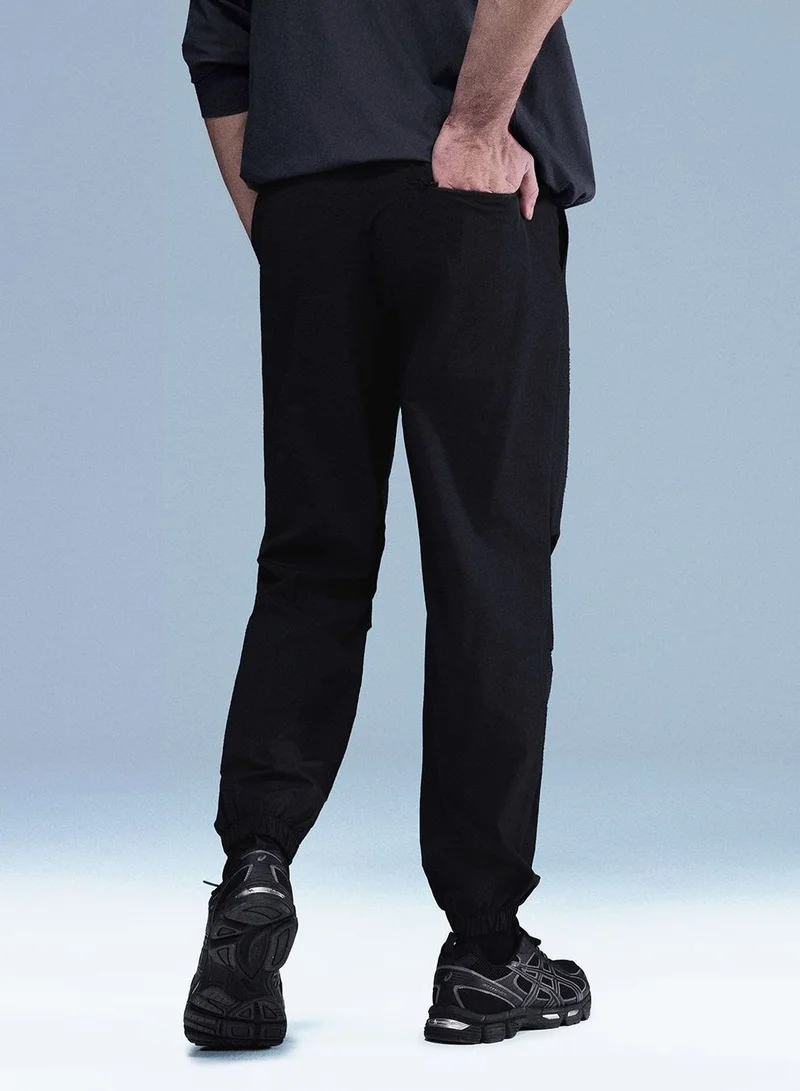 Giordano  Men Regular Mid Rise Nylon Stretch Pants for Men | Best Price UAE