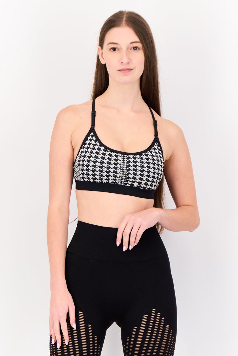 Nike حمالة صدر رياضية بدون أكمام للنساء مبطنة قليلاً، متعددة الألوان - Image 1