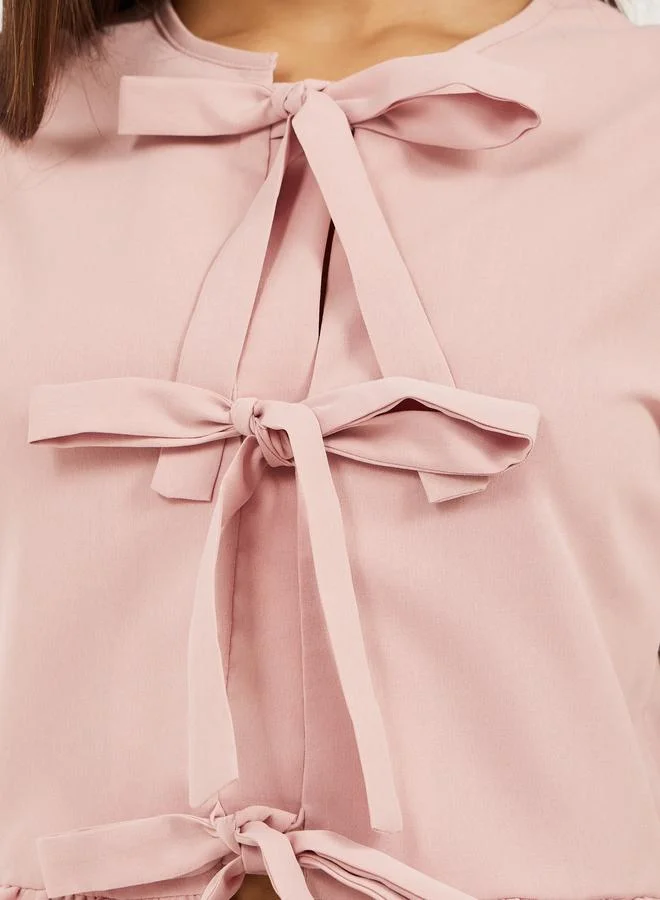 Styli Styli Plain Puff Sleeves Peplum Top with Tie Detail