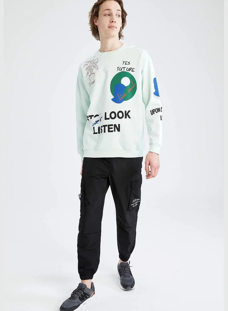 DeFacto Boxy Fit Long Sleeve Slogan Printed Sweatshirt