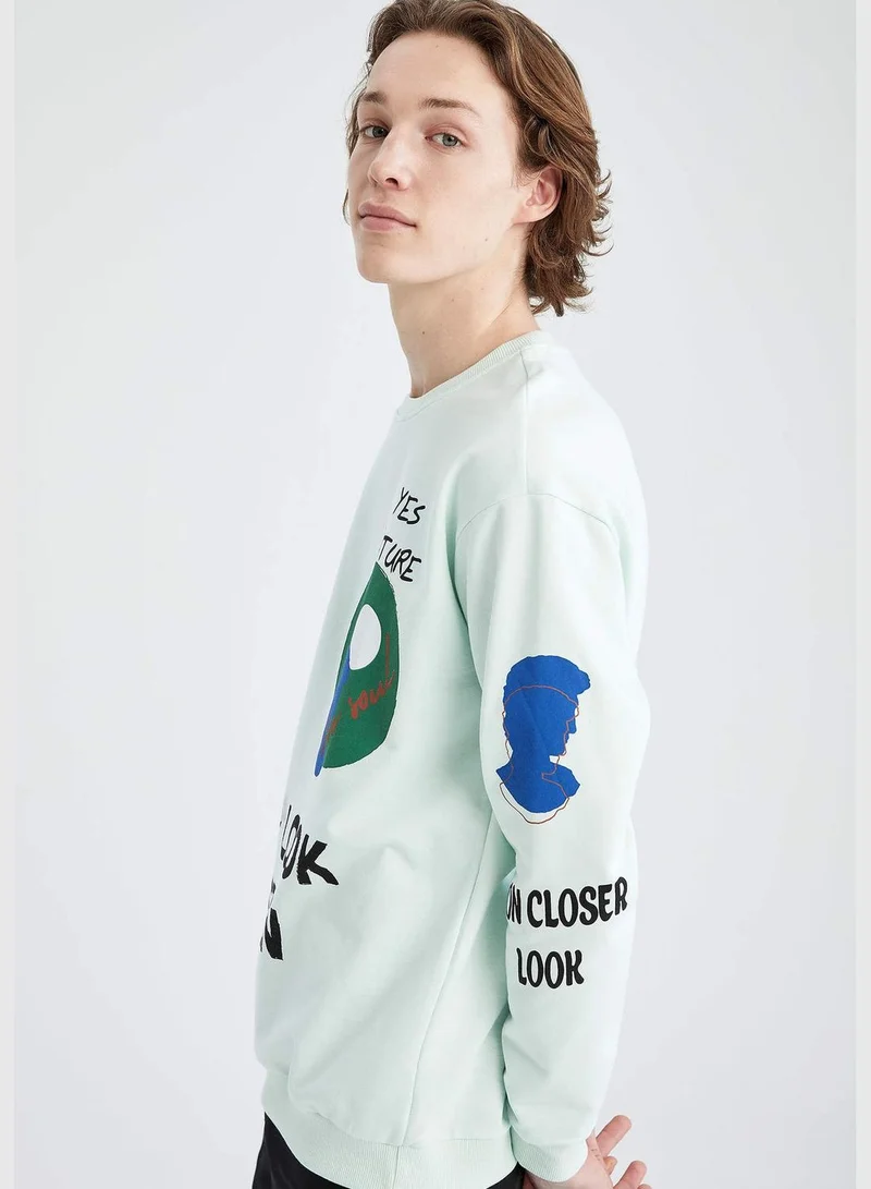 DeFacto Boxy Fit Long Sleeve Slogan Printed Sweatshirt