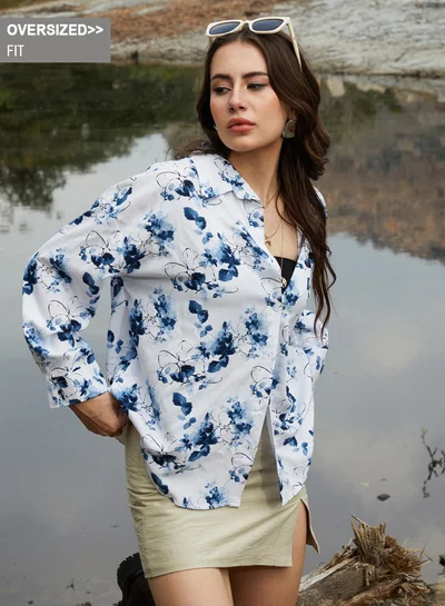 Campus Sutra Campus Sutra Women's Navy Blue Botanical Strokes Oversized Shirt For Casual Wear | Spread Collar | Long Sleeve | Button Closure | Oversized Shirt Crafted With Comfort Fit For Everyday Wear