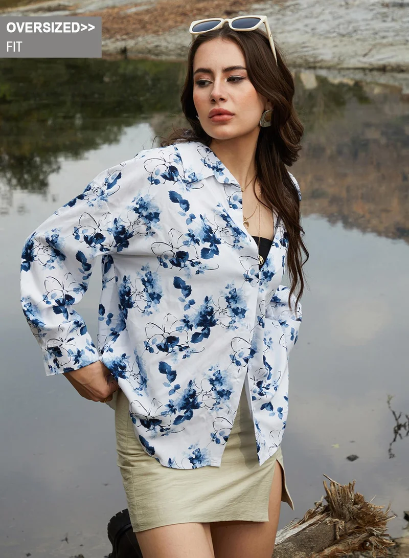 Campus Sutra Campus Sutra Women's Navy Blue Botanical Strokes Oversized Shirt For Casual Wear | Spread Collar | Long Sleeve | Button Closure | Oversized Shirt Crafted With Comfort Fit For Everyday Wear