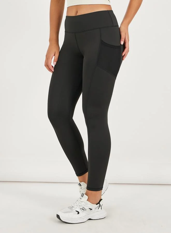 ستايلي اكتيف ليجنز بخصر عريض وجيب شبكي جانبي