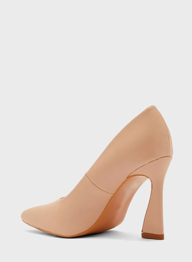Ginger Curved Heel Pointed Pump Nude