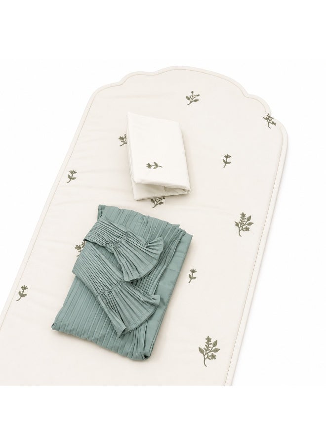 The Sakina prayer rug set is a distinctive set consisting of a prayer rug with a foam lining in the shape of a mihrab, and a plain prayer shawl with elegant pleats and an attached headscarf. One large size for women.