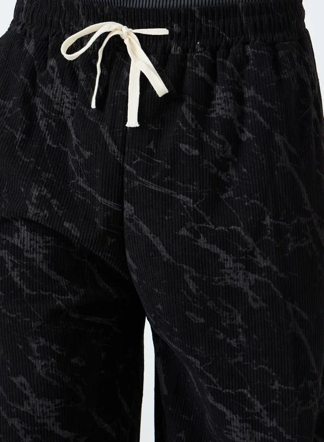 ستايلي بنطال باجي بقصة أرجل واسعة