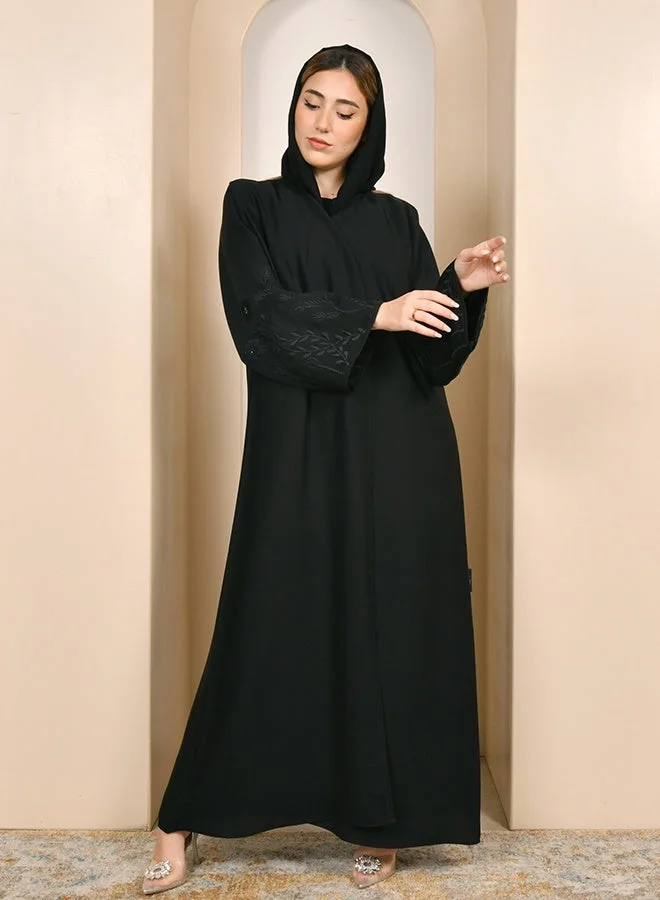 HAWRAA ABAYA Simple black abaya featuring sleeves adorned with delicate tree-inspired embroidery