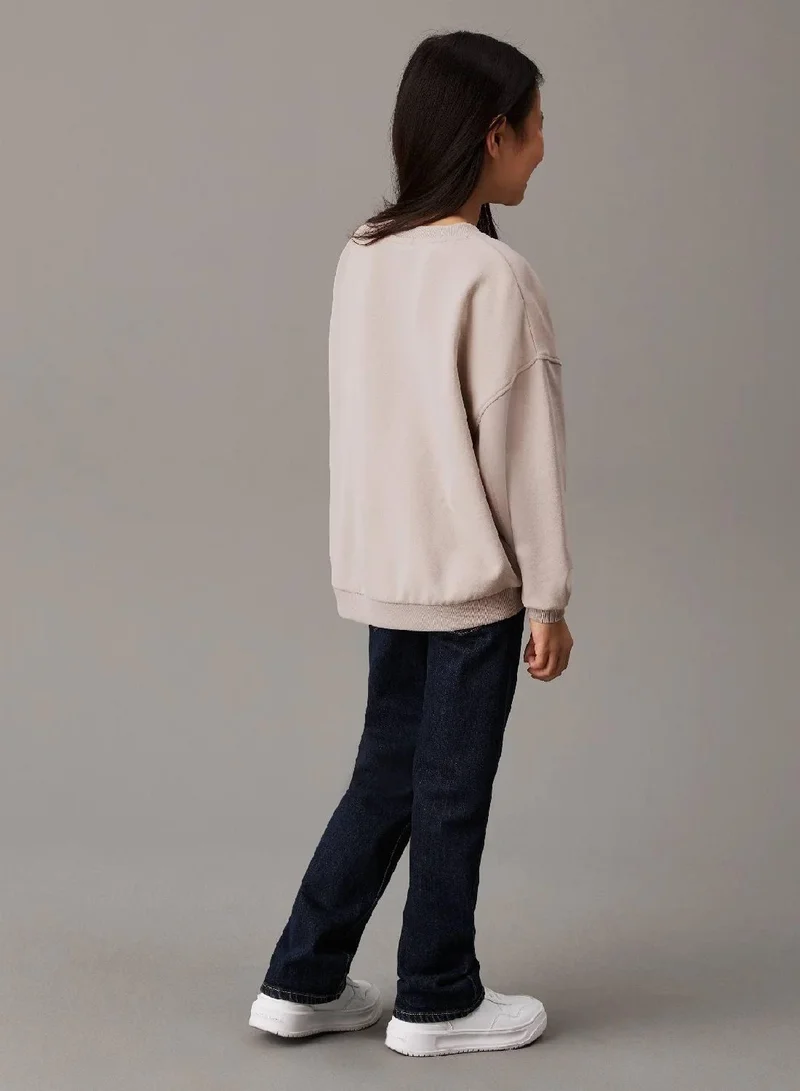 كالفن كلاين جينز سويت شيرت بقصة مريحة مزين بشعار كلفن كلاين