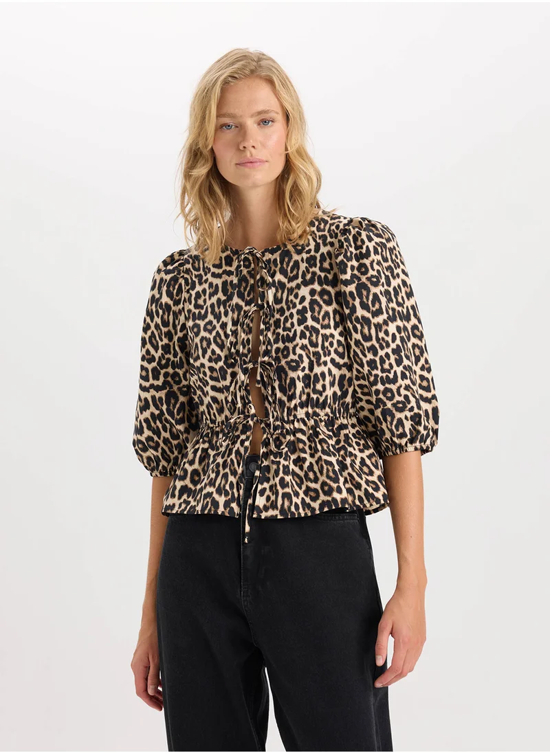 ديفاكتو Fitted Round Neck Leopard Print Front-Tied Poplin Long Sleeve Blouse