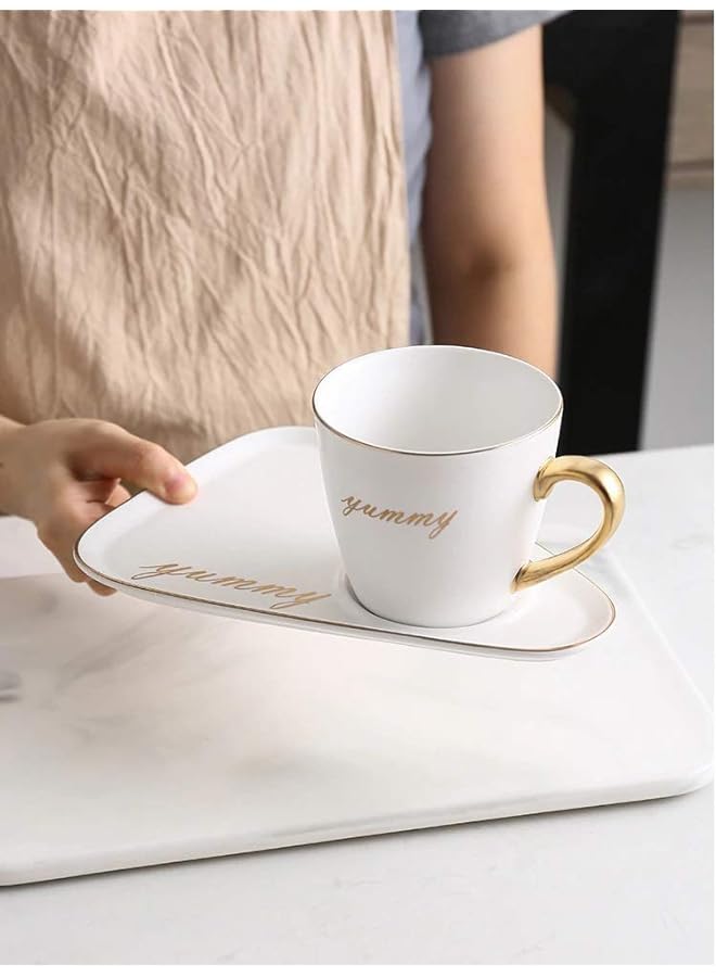 هوم كونسيبت طقم فناجين قهوة وصحون مثلثة بحافة ذهبية من السيراميك الشمالي مع ملعقة باللون الأبيض، مكون من 3 قطع - Image 1