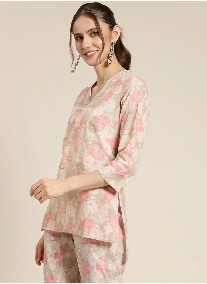 SASSAFRAS Geometric Print High Low Hem Top by Styli