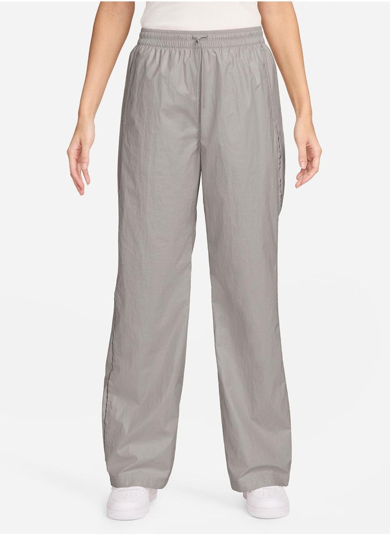 Nike Women's Woven High-Waisted Open-Hem Trousers  - Image 1
