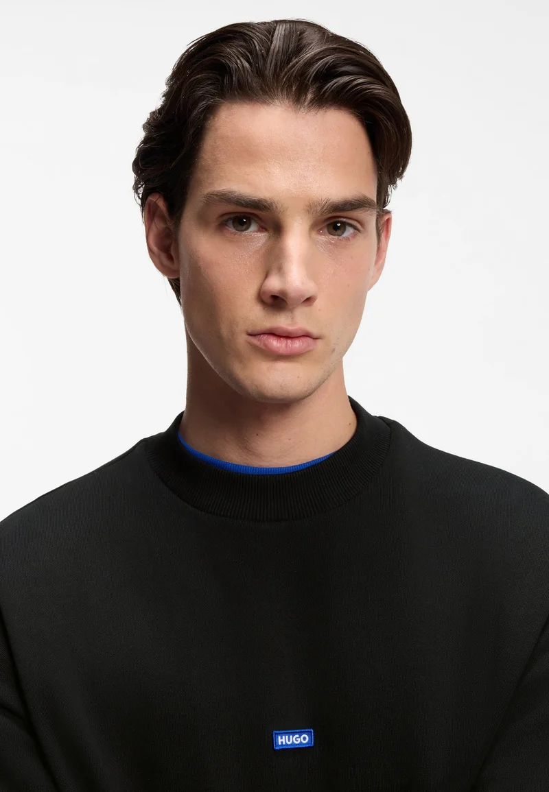 HUGO Black Cotton-terry sweatshirt with blue logo patch for Men | Best Price UAE