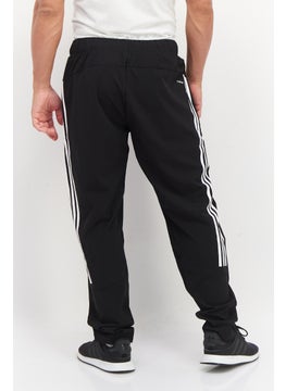 Men Sportswear Fit Brand Logo Track Pant, Black - pzsku/Z48AA397D84AD139FCF40Z/45/_/1738937390/dcabcdc4-86ed-4542-948e-4431278f0ef9