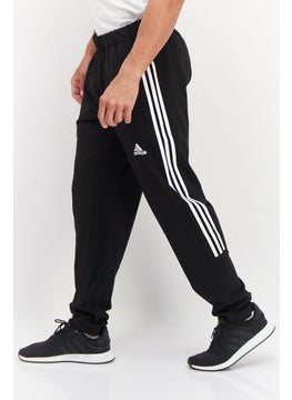 Men Sportswear Fit Brand Logo Track Pant, Black - pzsku/Z48AA397D84AD139FCF40Z/45/_/1738937394/4f0b348c-f53a-48be-ba36-76b15f7d1cec