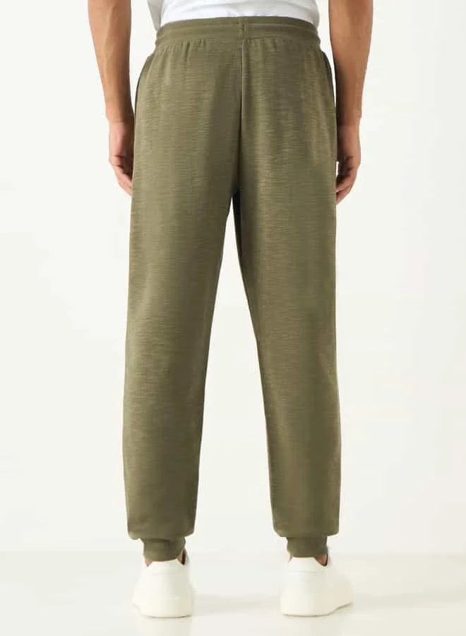Kappa Kappa Logo Detail Joggers with Drawstring Closure and Pockets