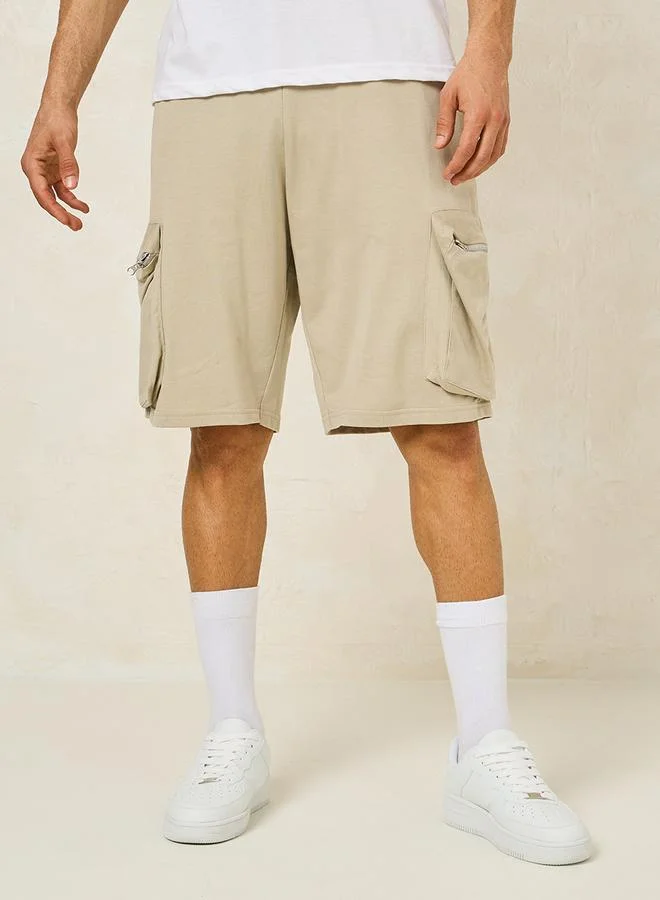 Styli Styli Solid Oversized Shorts with Cargo Pocket Detail