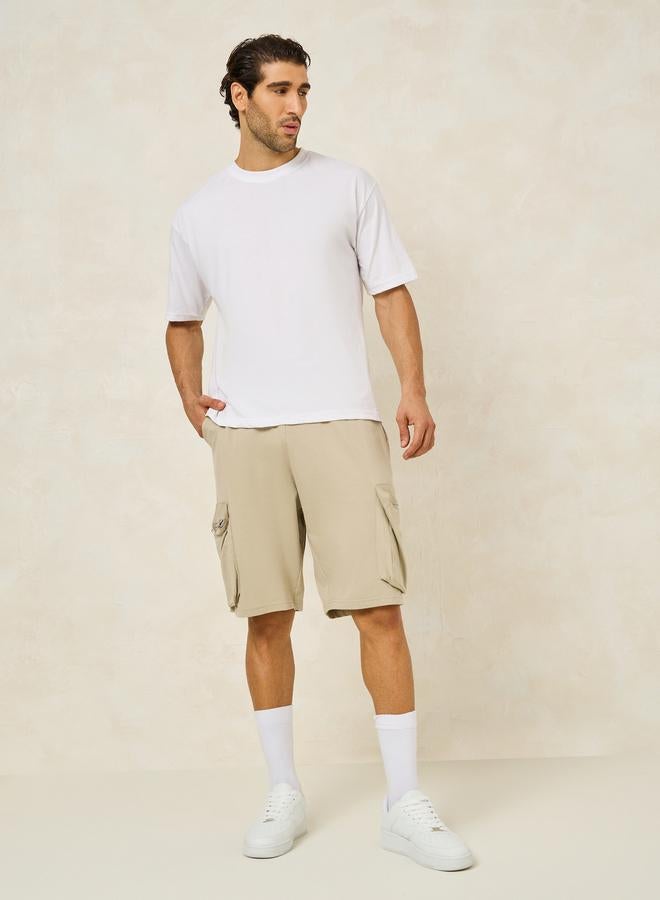 ستايلي شورت ستايلي سادة بقصة واسعة وجيب كارجو - Image 2