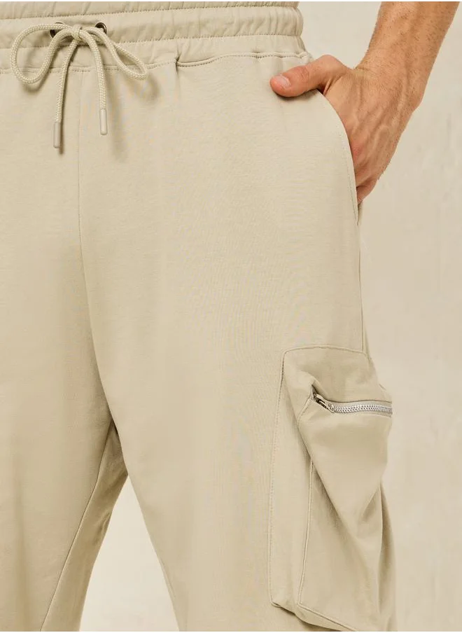 ستايلي Solid Oversized Shorts with Cargo Pocket Detail