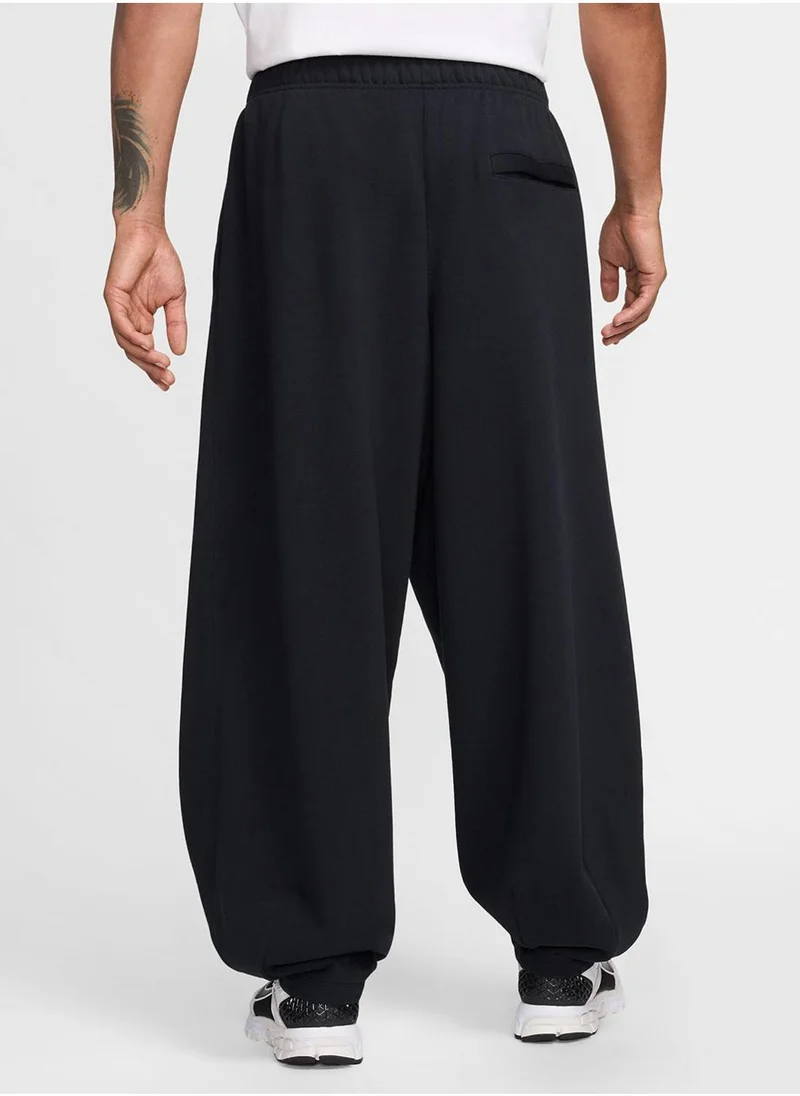 Nike Club Fitted Oversized Sweatpants