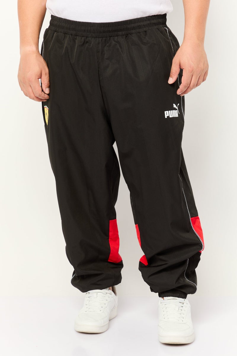 Puma x Scuderia Ferrari Men Sportswear Fit Track Pants, Black - Image 1