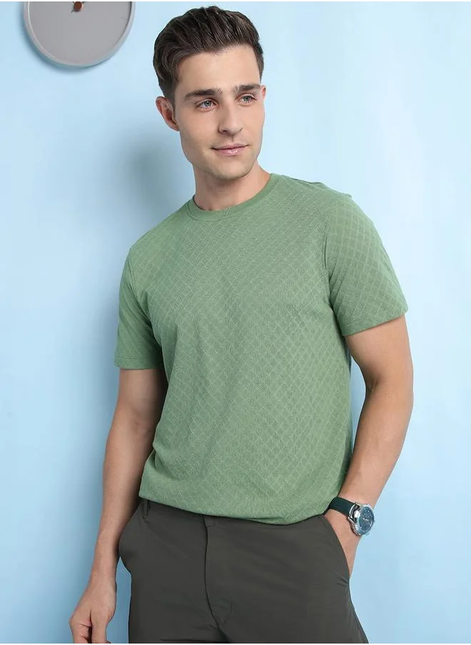 دينيس لينغو Classic Olive Regular Fit T-Shirt for Men, made from a premium blend of 60% cotton and 40% polyester, featuring a solid pattern and a regular collar for a versatile casual look.