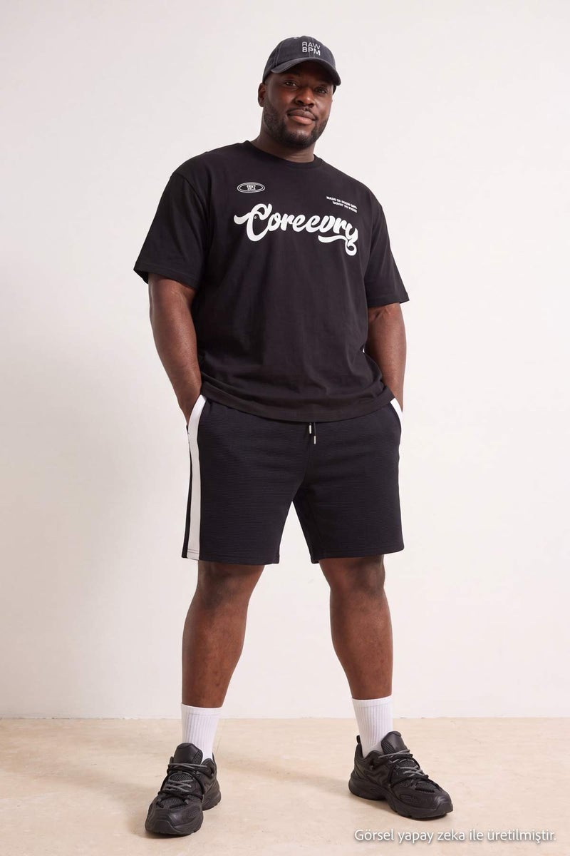 trendyol Plus Size Navy Blue Regular/Normal Cut Mid-Length Elastic Waist Color Paneled Shorts Tmnss23Sr00046 - Image 1