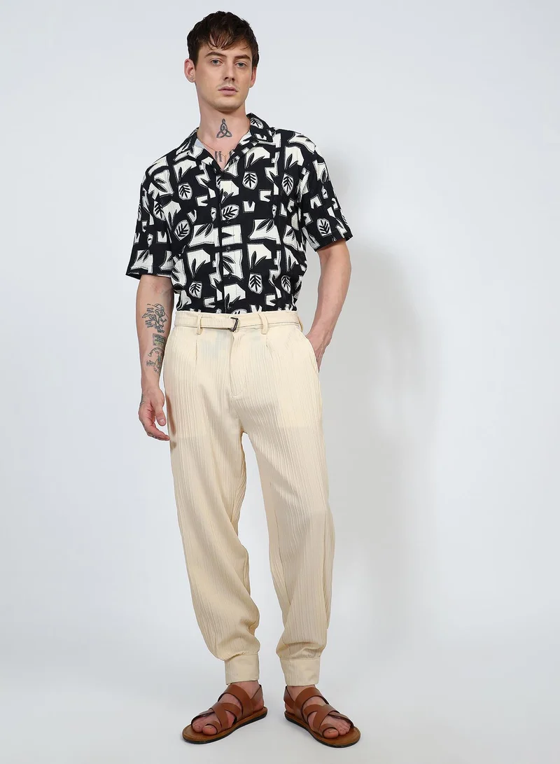Campus Sutra  Lightweight - Textured Cuff-Hem Trousers for Men | Best Price UAE