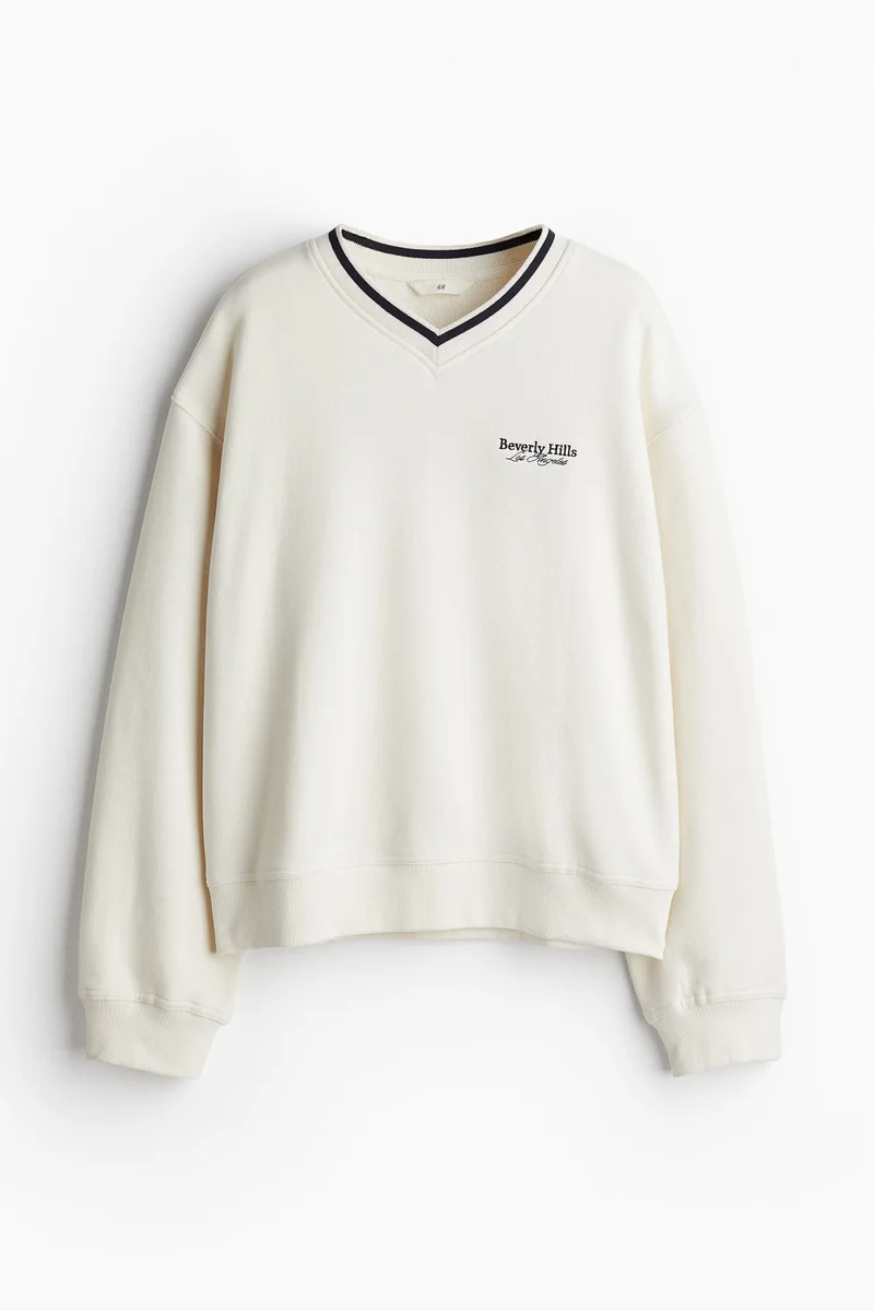 اتش اند ام كنزة بقبة على شكل V