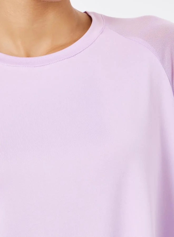 ستايلي اكتيف بلوزة يوجا بقصة واسعة وتفاصيل شبكية