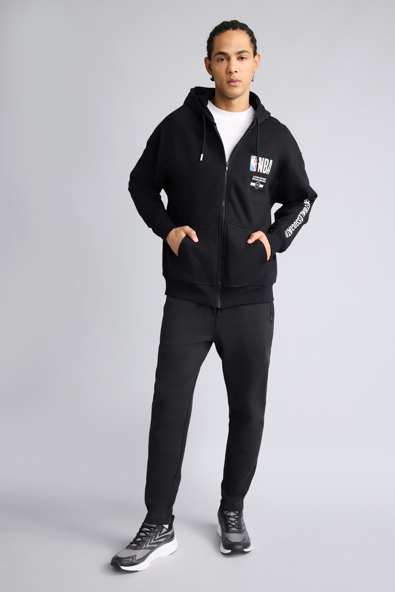 ديفاكتو هودي اوفر سايز بكابيشون من NBA - Image 2