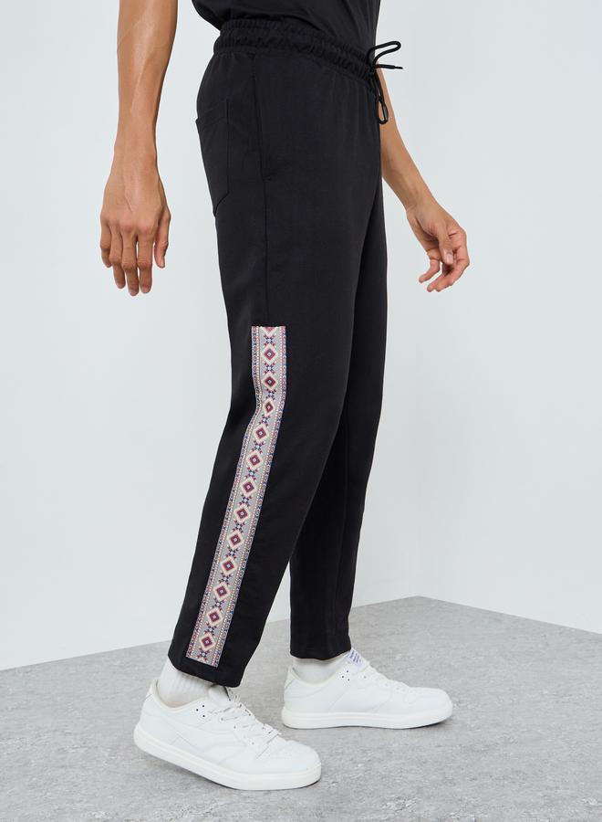 Styli Men Black Joggers with Ethnic Print Side Stripe - Image 1