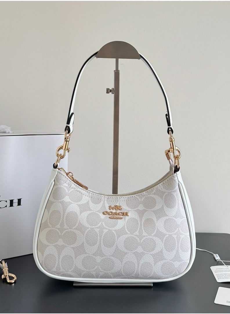 coachoutlet - Coach Teri Hobo Bag In Signature Canvas - Image 1